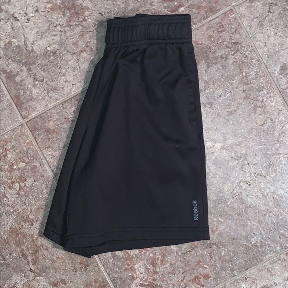 black reebok shorts.